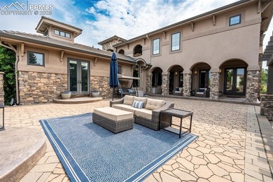 Discover luxury living in this beautifully crafted custom home on The Club At Flying Horse in Colorado - for sale on GolfHomes.com, golf home, golf lot