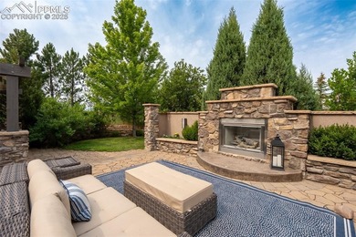 Discover luxury living in this beautifully crafted custom home on The Club At Flying Horse in Colorado - for sale on GolfHomes.com, golf home, golf lot
