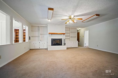 Welcome home to this lovely 3 bedroom 2 bathroom brick ranch on on Lake Forest Yacht and Country Club in Alabama - for sale on GolfHomes.com, golf home, golf lot