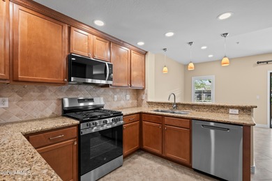 Stunning first-floor corner unit in the Bella Monte, gated, golf on Wildfire Golf Club in Arizona - for sale on GolfHomes.com, golf home, golf lot