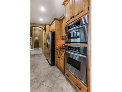Experience luxury living in this stunning Reverse 1.5 story Don on Falcon Ridge Golf Course in Kansas - for sale on GolfHomes.com, golf home, golf lot