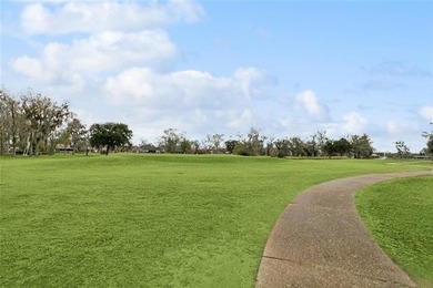 This spacious well maintained three bedroom, two bathroom homes on Willowdale Country Club in Louisiana - for sale on GolfHomes.com, golf home, golf lot