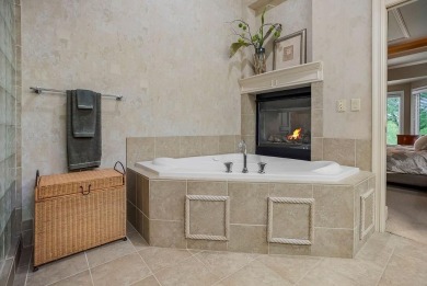 Experience luxury living in this stunning Reverse 1.5 story Don on Falcon Ridge Golf Course in Kansas - for sale on GolfHomes.com, golf home, golf lot