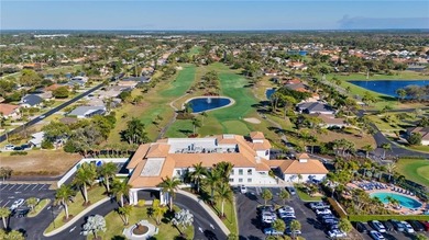Rare opportunity to acquire a first-floor end unit in the Puesta on Spanish Wells Golf and Country Club in Florida - for sale on GolfHomes.com, golf home, golf lot
