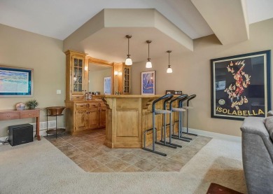 Experience luxury living in this stunning Reverse 1.5 story Don on Falcon Ridge Golf Course in Kansas - for sale on GolfHomes.com, golf home, golf lot