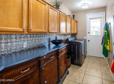 Tucked into one of Gilbert's most loved neighborhoods, this home on Seville Golf and Country Club in Arizona - for sale on GolfHomes.com, golf home, golf lot