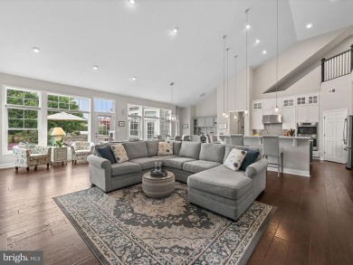 The welcoming covered entry of 33437 Islander Drive invites you on The Peninsula Golf and Country Club in Delaware - for sale on GolfHomes.com, golf home, golf lot