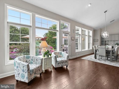 The welcoming covered entry of 33437 Islander Drive invites you on The Peninsula Golf and Country Club in Delaware - for sale on GolfHomes.com, golf home, golf lot