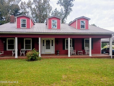 This is a great country house to accommodate a single family or on Land-O-Lakes Golf Course in North Carolina - for sale on GolfHomes.com, golf home, golf lot