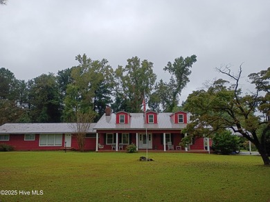 This is a great country house to accommodate a single family or on Land-O-Lakes Golf Course in North Carolina - for sale on GolfHomes.com, golf home, golf lot