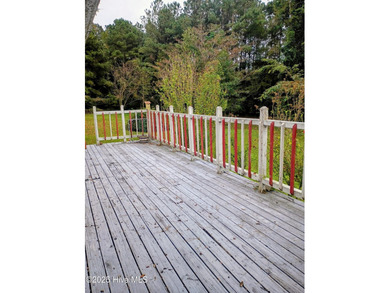 This is a great country house to accommodate a single family or on Land-O-Lakes Golf Course in North Carolina - for sale on GolfHomes.com, golf home, golf lot