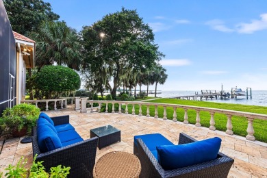 WESTWARD-FACING SINGLE-STORY WATERFRONT ESTATE WITHIN ESTEEMED on Kelly Plantation Golf Club in Florida - for sale on GolfHomes.com, golf home, golf lot