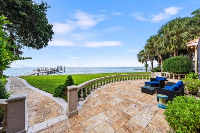 WESTWARD-FACING SINGLE-STORY WATERFRONT ESTATE WITHIN ESTEEMED on Kelly Plantation Golf Club in Florida - for sale on GolfHomes.com, golf home, golf lot