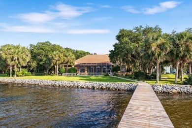 WESTWARD-FACING SINGLE-STORY WATERFRONT ESTATE WITHIN ESTEEMED on Kelly Plantation Golf Club in Florida - for sale on GolfHomes.com, golf home, golf lot