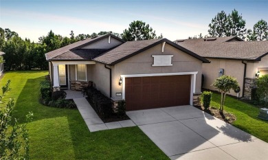 Carefree living awaits in this beautiful Noir Coast model on Stone Creek Golf Club in Florida - for sale on GolfHomes.com, golf home, golf lot