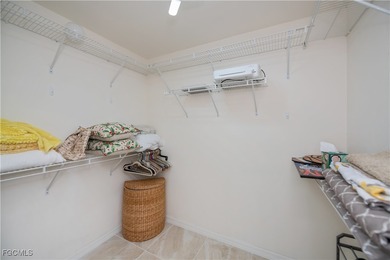 First-floor resort-style living, Furnished and beautifully on Colonial Country Club in Florida - for sale on GolfHomes.com, golf home, golf lot