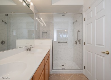 First-floor resort-style living, Furnished and beautifully on Colonial Country Club in Florida - for sale on GolfHomes.com, golf home, golf lot