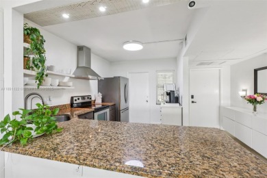 Beautifully updated 2 bed, 2 bath first-floor condo with on Palm-Aire Country Club and Resort - Palms in Florida - for sale on GolfHomes.com, golf home, golf lot