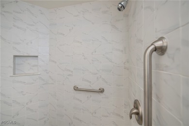 First-floor resort-style living, Furnished and beautifully on Colonial Country Club in Florida - for sale on GolfHomes.com, golf home, golf lot