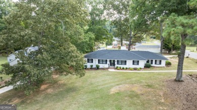 Completely remodeled brick ranch just steps from Cherokee Golf on Cherokee Golf and Country Club in Georgia - for sale on GolfHomes.com, golf home, golf lot