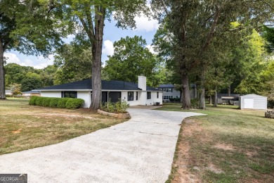 Completely remodeled brick ranch just steps from Cherokee Golf on Cherokee Golf and Country Club in Georgia - for sale on GolfHomes.com, golf home, golf lot