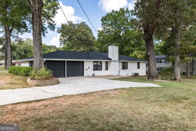 Completely remodeled brick ranch just steps from Cherokee Golf on Cherokee Golf and Country Club in Georgia - for sale on GolfHomes.com, golf home, golf lot