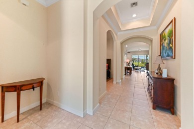 Presenting an impressive RIVIERA Model residence in the renowned on PGA Golf Club in PGA Village in Florida - for sale on GolfHomes.com, golf home, golf lot