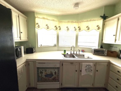 Move in ready at a great price!! This 2 bed, 2 bath home is on Whisperwood Golf Course in Florida - for sale on GolfHomes.com, golf home, golf lot