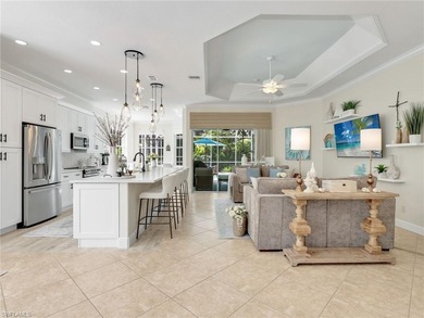 Your coastal-inspired retreat awaits tucked within Canterbury on Kensington Golf and Country Club in Florida - for sale on GolfHomes.com, golf home, golf lot