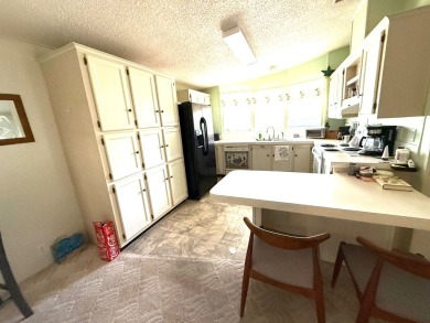 Move in ready at a great price!! This 2 bed, 2 bath home is on Whisperwood Golf Course in Florida - for sale on GolfHomes.com, golf home, golf lot