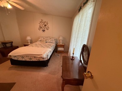 Move in ready at a great price!! This 2 bed, 2 bath home is on Whisperwood Golf Course in Florida - for sale on GolfHomes.com, golf home, golf lot