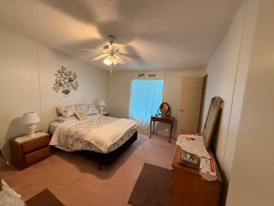 Move in ready at a great price!! This 2 bed, 2 bath home is on Whisperwood Golf Course in Florida - for sale on GolfHomes.com, golf home, golf lot
