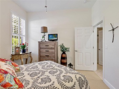 Your coastal-inspired retreat awaits tucked within Canterbury on Kensington Golf and Country Club in Florida - for sale on GolfHomes.com, golf home, golf lot