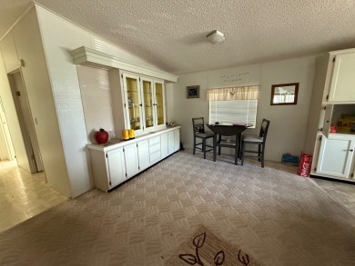 Move in ready at a great price!! This 2 bed, 2 bath home is on Whisperwood Golf Course in Florida - for sale on GolfHomes.com, golf home, golf lot