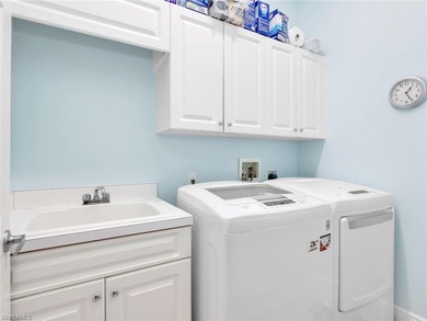 Your coastal-inspired retreat awaits tucked within Canterbury on Kensington Golf and Country Club in Florida - for sale on GolfHomes.com, golf home, golf lot