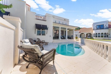 Welcome to this exceptional two-story villa in the exclusive on Sandestin Golf and Beach Resort - Raven in Florida - for sale on GolfHomes.com, golf home, golf lot