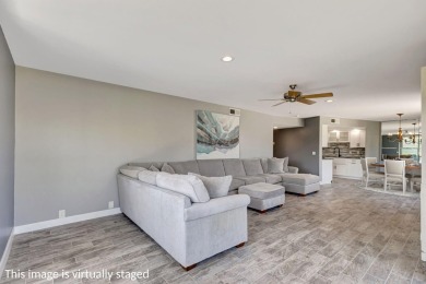 BEAUTIFULLY UPDATED FIRST FLOOR CORNER UNIT, PRIVATE & IDEALLY on BallenIsles Golf and Country Club in Florida - for sale on GolfHomes.com, golf home, golf lot