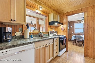 Discover this beautifully Split Rock Cottage, perfectly situated on Split Rock Resort and Country Club in Pennsylvania - for sale on GolfHomes.com, golf home, golf lot