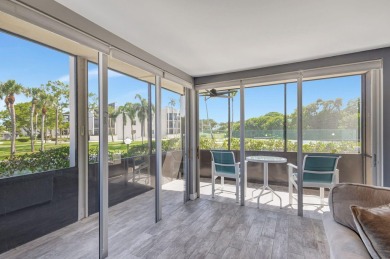 BEAUTIFULLY UPDATED FIRST FLOOR CORNER UNIT, PRIVATE & IDEALLY on BallenIsles Golf and Country Club in Florida - for sale on GolfHomes.com, golf home, golf lot