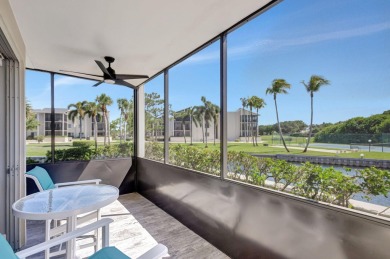 BEAUTIFULLY UPDATED FIRST FLOOR CORNER UNIT, PRIVATE & IDEALLY on BallenIsles Golf and Country Club in Florida - for sale on GolfHomes.com, golf home, golf lot