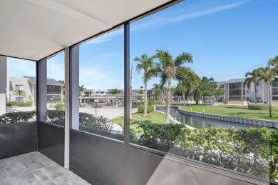 BEAUTIFULLY UPDATED FIRST FLOOR CORNER UNIT, PRIVATE & IDEALLY on BallenIsles Golf and Country Club in Florida - for sale on GolfHomes.com, golf home, golf lot