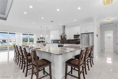 MAGNIFICENT CUSTOM BUILT, WATERFRONT HOME WITH 3,849 SQ FT OF on Palmetto-Pine Country Club in Florida - for sale on GolfHomes.com, golf home, golf lot