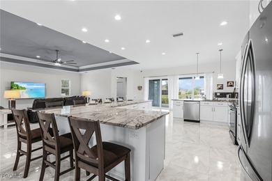 MAGNIFICENT CUSTOM BUILT, WATERFRONT HOME WITH 3,849 SQ FT OF on Palmetto-Pine Country Club in Florida - for sale on GolfHomes.com, golf home, golf lot