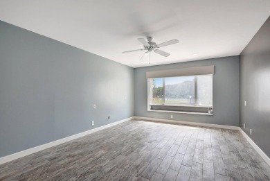 BEAUTIFULLY UPDATED FIRST FLOOR CORNER UNIT, PRIVATE & IDEALLY on BallenIsles Golf and Country Club in Florida - for sale on GolfHomes.com, golf home, golf lot