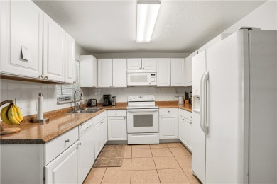 Charming Key West style 3 bedroom, 2 bath, 1 car garage home on on Sebastian Municipal Golf Course in Florida - for sale on GolfHomes.com, golf home, golf lot