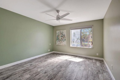 BEAUTIFULLY UPDATED FIRST FLOOR CORNER UNIT, PRIVATE & IDEALLY on BallenIsles Golf and Country Club in Florida - for sale on GolfHomes.com, golf home, golf lot