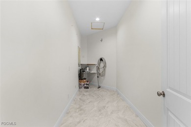 MAGNIFICENT CUSTOM BUILT, WATERFRONT HOME WITH 3,849 SQ FT OF on Palmetto-Pine Country Club in Florida - for sale on GolfHomes.com, golf home, golf lot