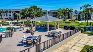 BEAUTIFULLY UPDATED FIRST FLOOR CORNER UNIT, PRIVATE & IDEALLY on BallenIsles Golf and Country Club in Florida - for sale on GolfHomes.com, golf home, golf lot