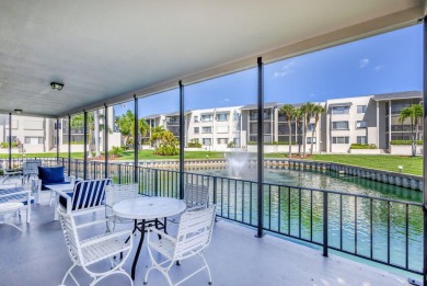 BEAUTIFULLY UPDATED FIRST FLOOR CORNER UNIT, PRIVATE & IDEALLY on BallenIsles Golf and Country Club in Florida - for sale on GolfHomes.com, golf home, golf lot