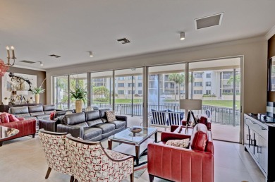 BEAUTIFULLY UPDATED FIRST FLOOR CORNER UNIT, PRIVATE & IDEALLY on BallenIsles Golf and Country Club in Florida - for sale on GolfHomes.com, golf home, golf lot